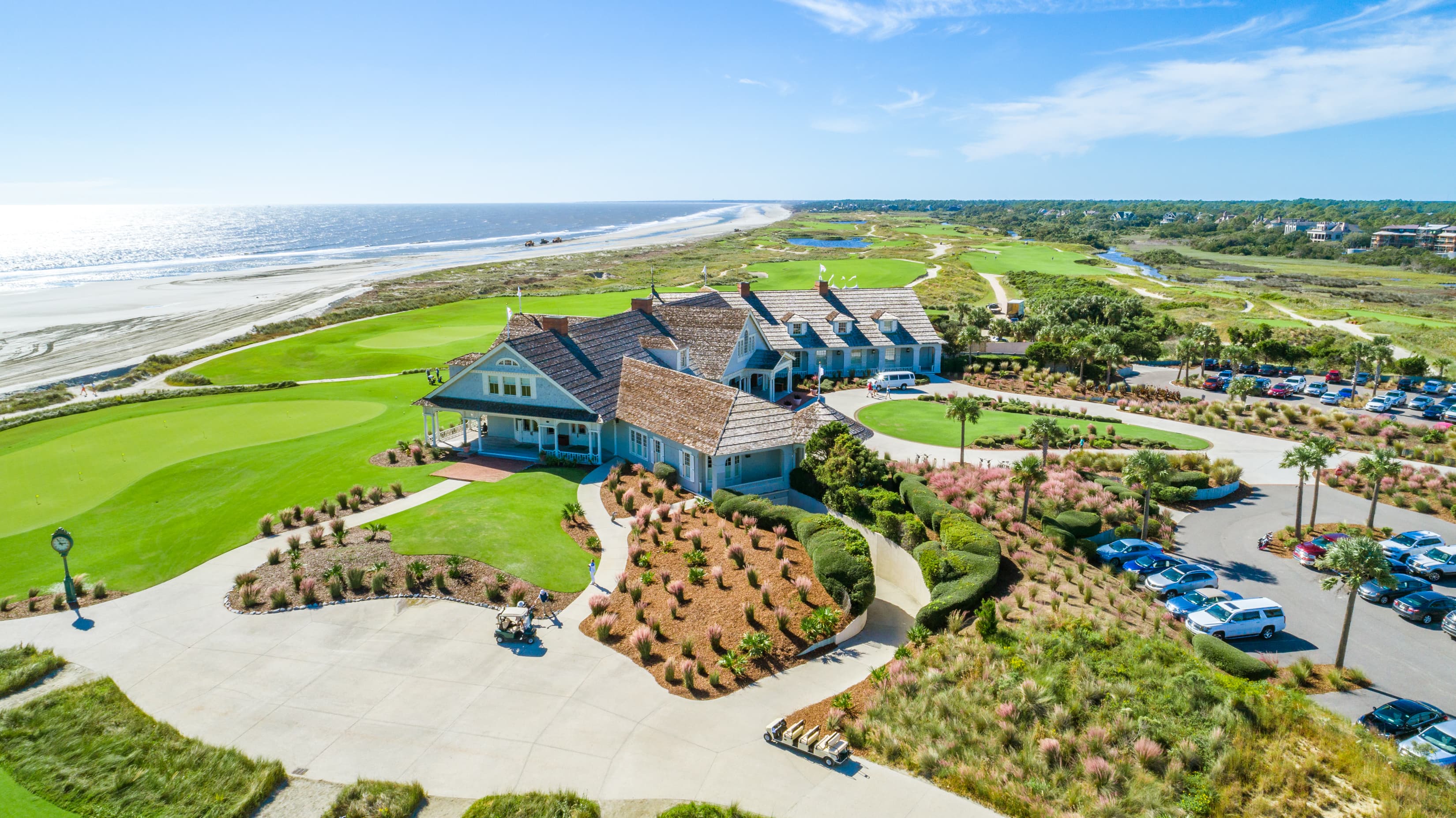 Kiawah Island Club clubhouse and golf course with Atlantic ocean in the background.